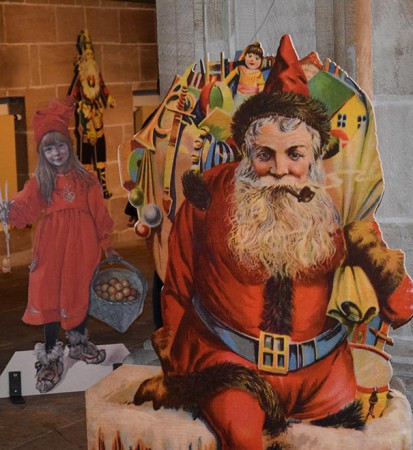 Santa Claus (Bilderbuch), USA um 1900. Weihnachtsbild "Brita als Idun" Carl Larson (1853–1919), schwedischer Maler, Titelbild der Zeitschrift die Jugend, München 1905 (links im Hintergrund).